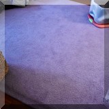 D21. Purple area rug. 7'6” x 11'2” 